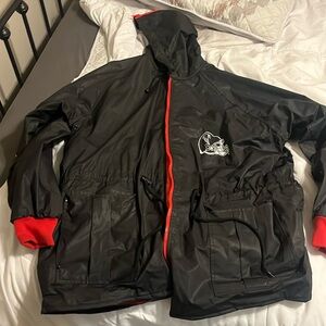 NFL large Falcons raincoat with warm fleece like material on the inside.